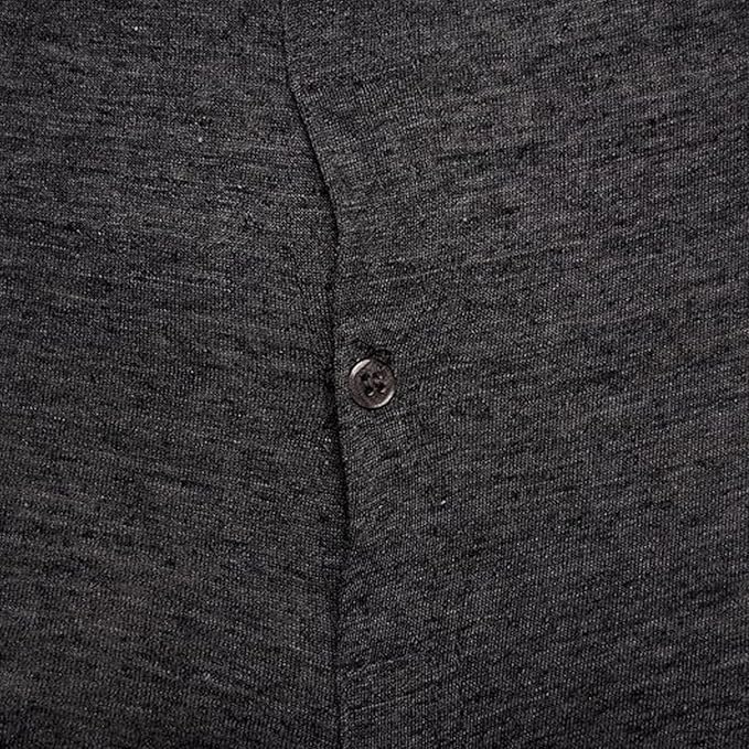 Close-up of a dark gray buttoned shirt with a button detail.