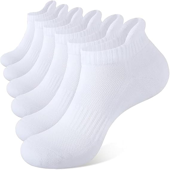 Set of six white ankle socks on a white background