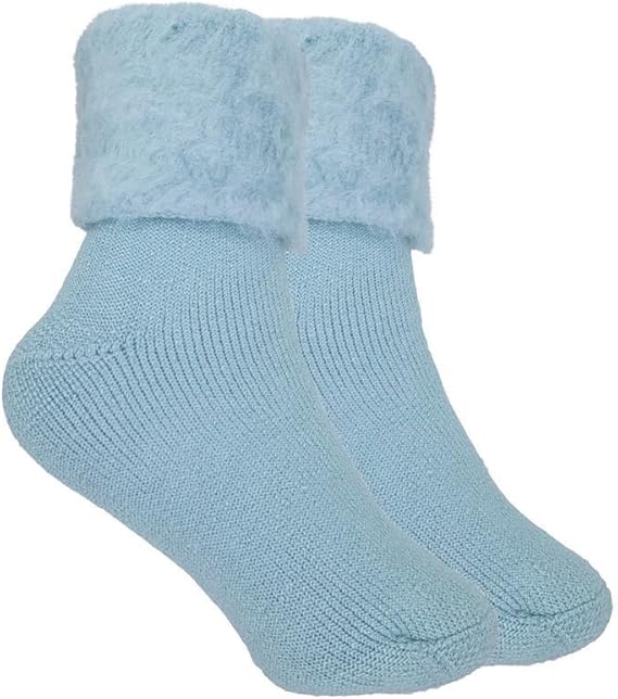 Light blue socks with fuzzy cuff on a white background