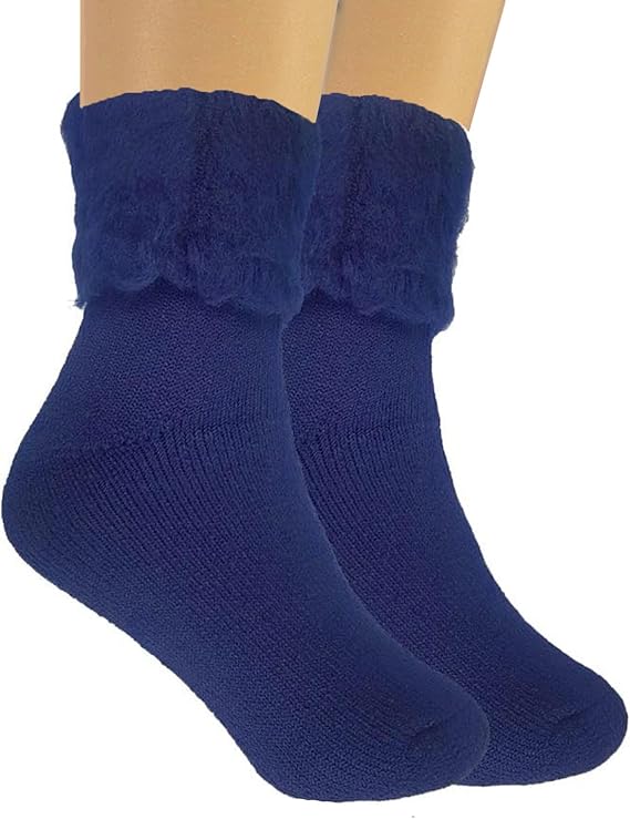 Pair of blue socks with fuzzy cuffs on a white background