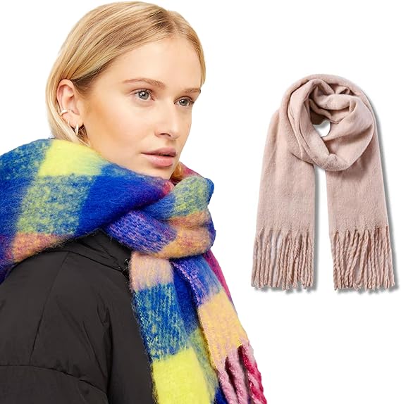 Woman wearing a colorful scarf with a plain pink scarf on a white background