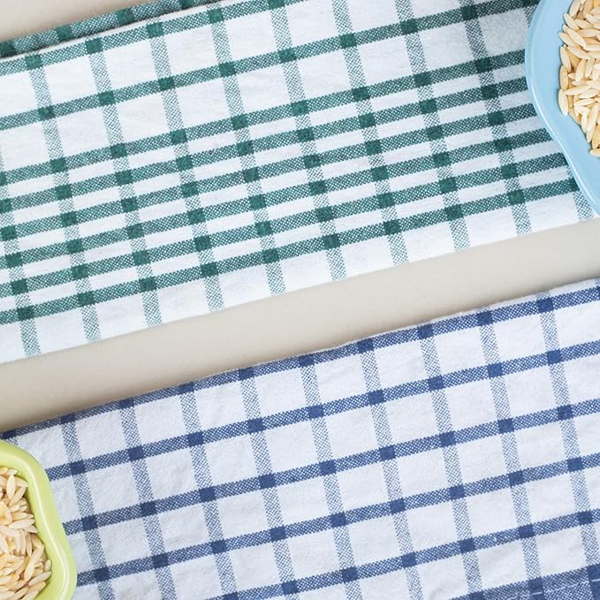 Two Terry Tea Towel On A Flat Surface For Kitchen Use