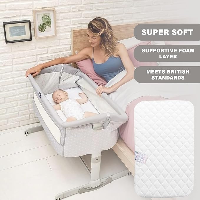 Infant Having a Cozy Sleep on chicco crib deluxe mattress