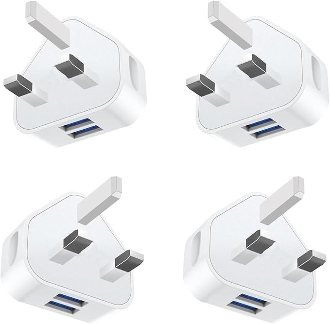 Four white USB-C to USB-A adapters on a white background