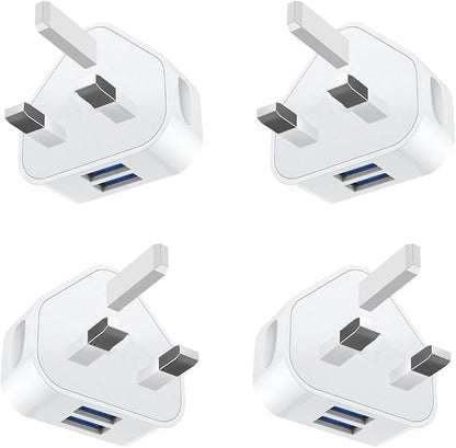 Four white USB-C to USB-A adapters on a white background