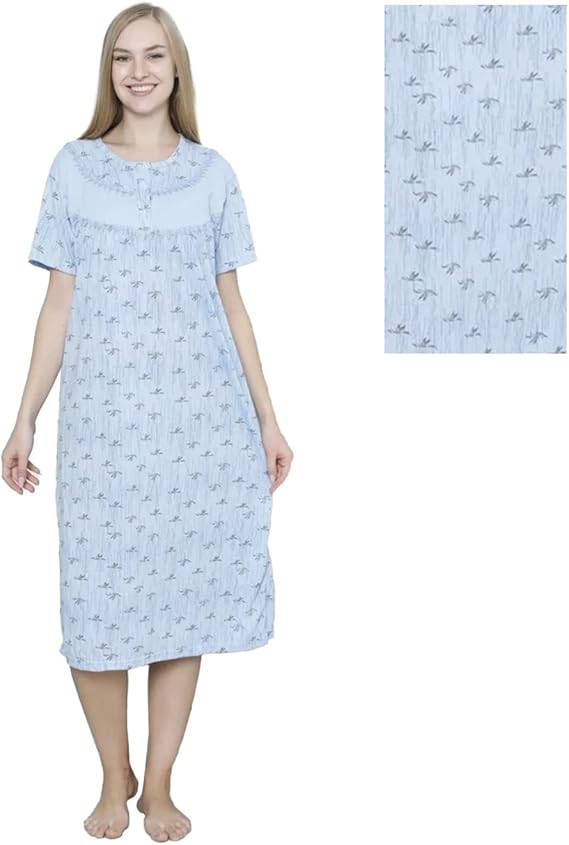 Woman wearing a light blue nightgown with a subtle pattern on a white background