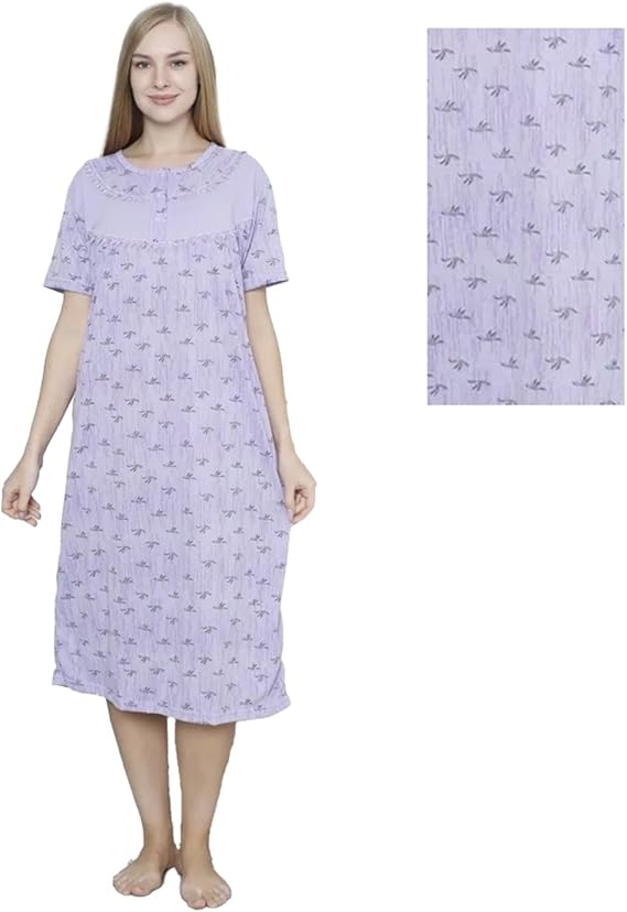 Woman wearing a purple nightgown with a matching towel on a white background