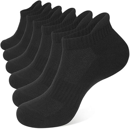 Set of six black ankle socks on a white background