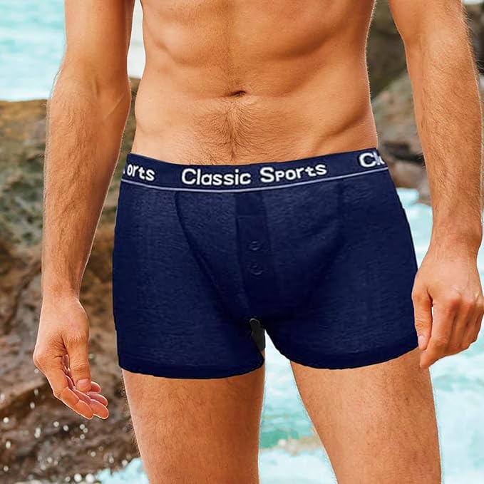 Navy blue boxer briefs with 'Classic Sports' waistband on a beach background