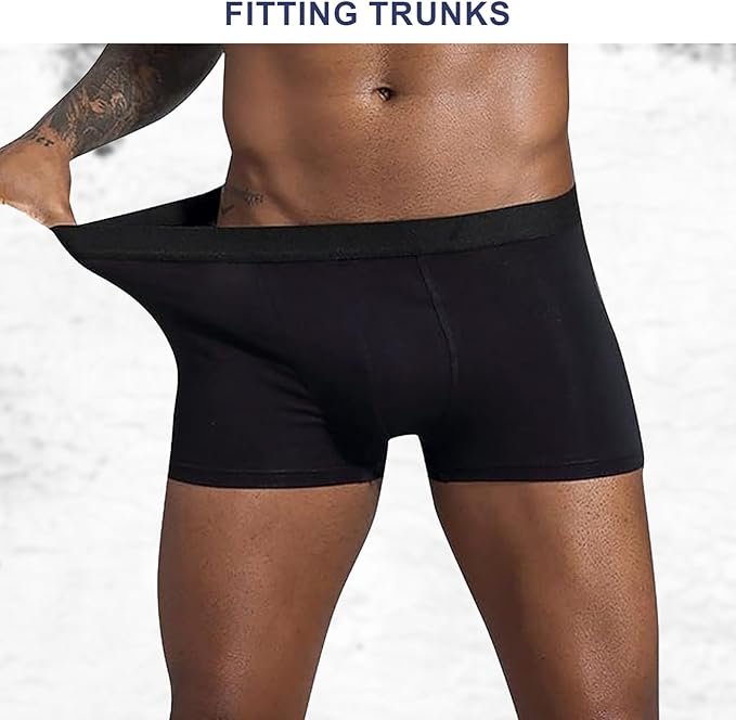 Black Fitted trunks being worn on a white background.