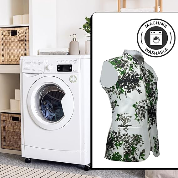 White washing machine with a floral dress displayed next to it, indicating machine washability.