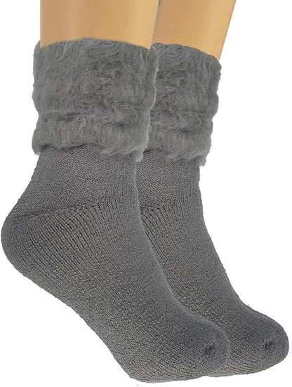 Gray knitted socks with textured cuffs on a white background