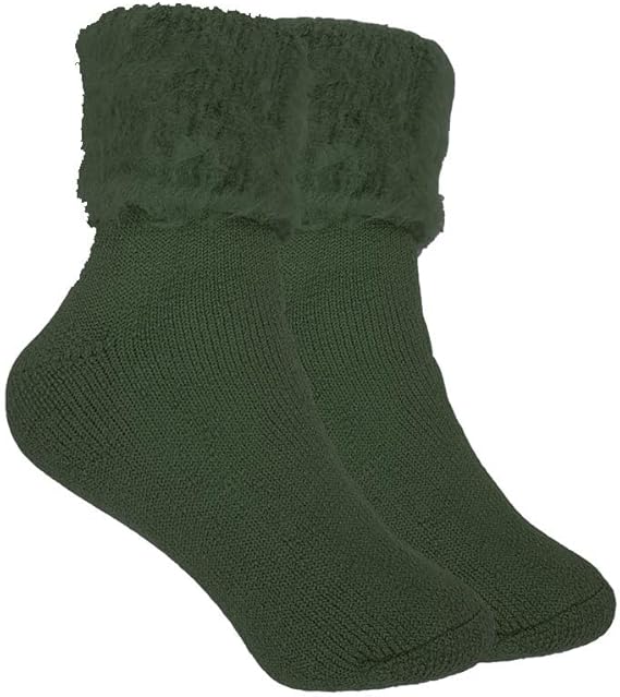Green socks with fuzzy cuff on a white background