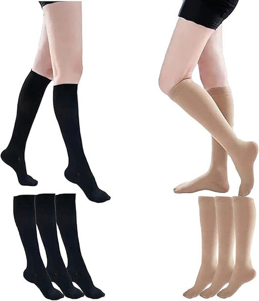 Black and beige knee-high socks displayed on a white background