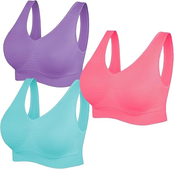 Three sports bras in purple, pink, and teal on a white background